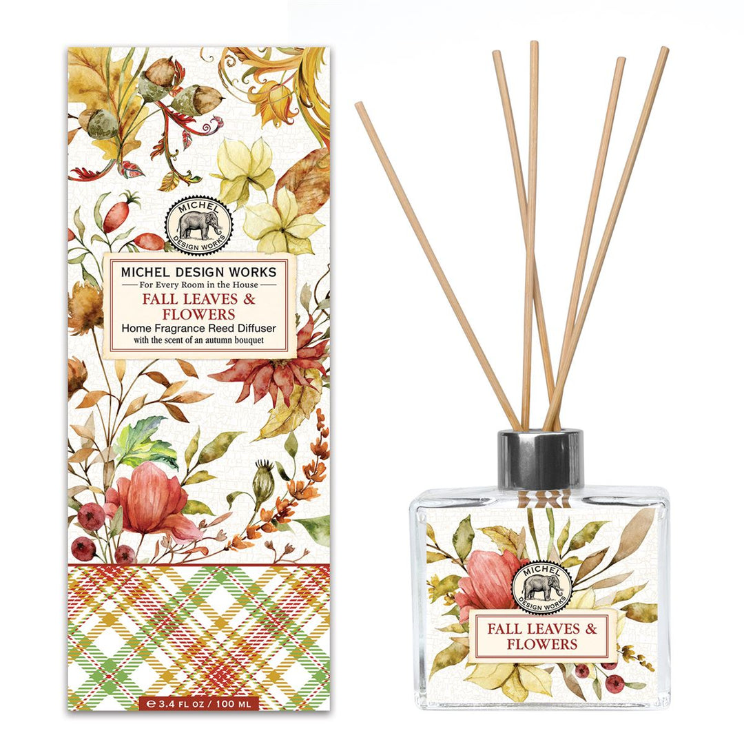 Home Fragrance Reed Diffuser with clear glass bottle containing light-colored liquid and multiple reed sticks.