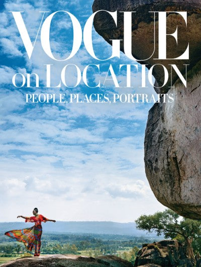 Hardcover book titled Vogue On Location featuring travel dispatches by Jan Morris and Truman Capote with editorial photography.