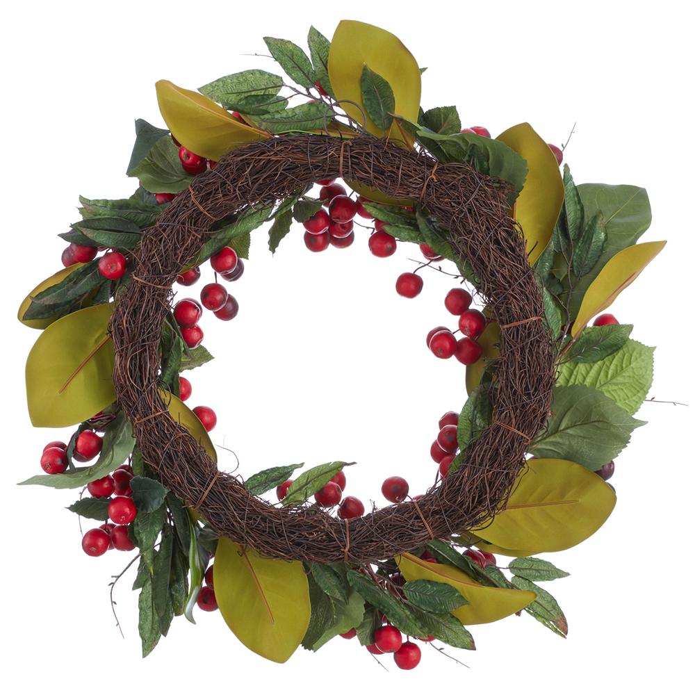 24-inch wreath featuring red crabapples and green magnolia leaves on a brown grapevine base.