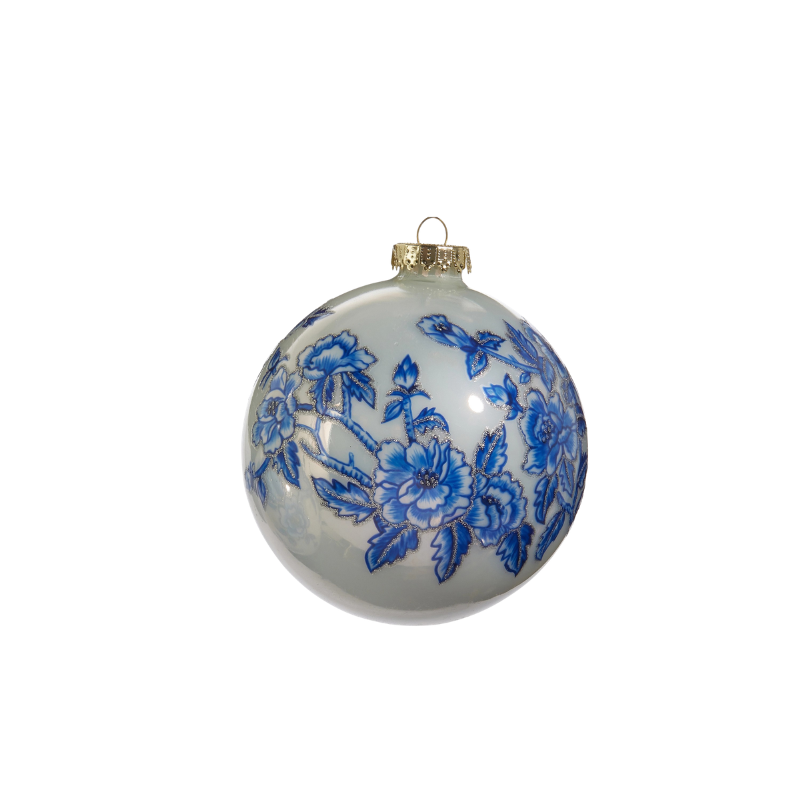 5-inch glass ball ornament with blue floral patterns and silver glitter accents.