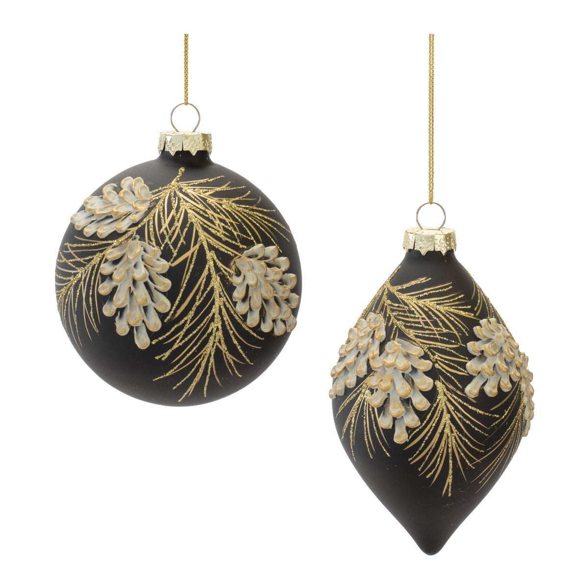 Black glass Christmas ornaments with gold pine needles and white pinecone accents.