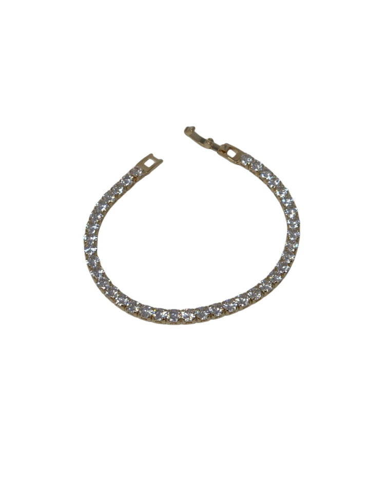 Gold crystal clasp bracelet featuring a continuous line of round-cut clear stones in a gold setting.