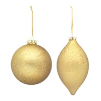 Gold textured ornament with ornate filigree detailing on a circular metal silhouette.