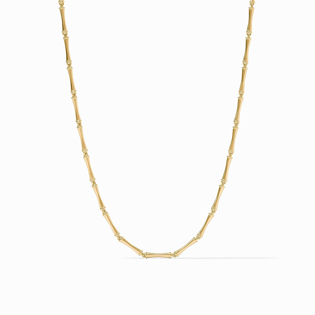 Gold necklace featuring a chain of bamboo-shaped links with a polished finish.