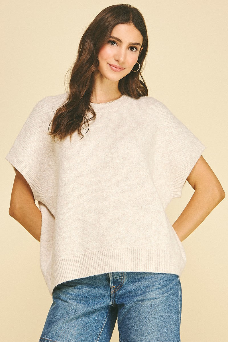 Bailey solid knit sweater in cap sleeve silhouette with a crew neckline.