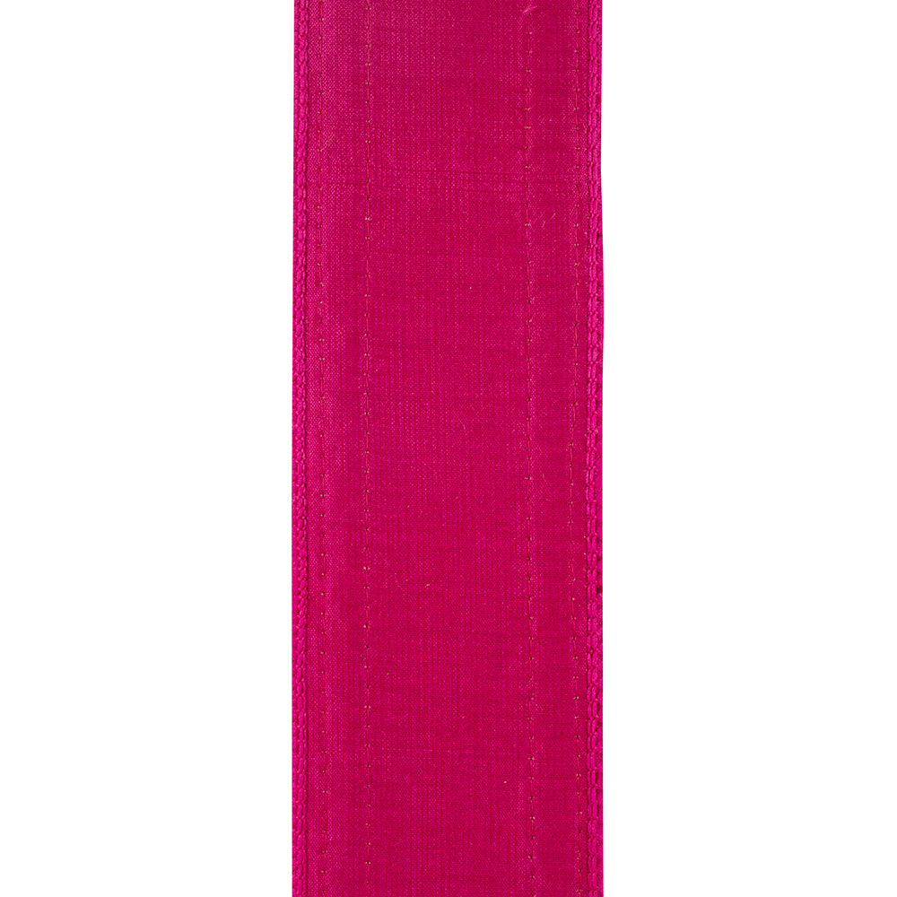 Fuchsia polyester wired edge braid ribbon with a multi-color pattern.