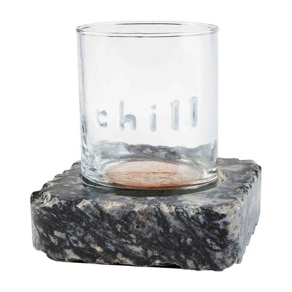 Black embossed double old fashioned glass with a square granite chilling stone.