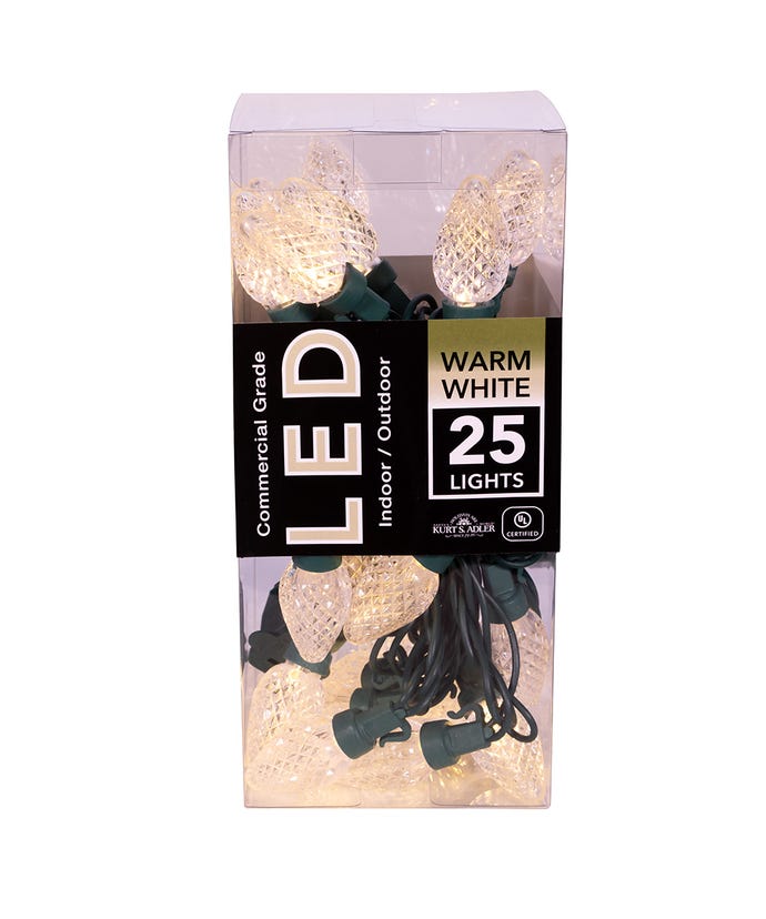 Boxed set of 25 warm white LED C7 lights with faceted bulbs and green wire for indoor/outdoor use.