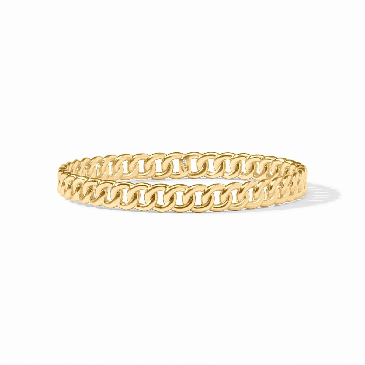 Gold-tone Dolce bangle bracelet with a smooth cylindrical shape.