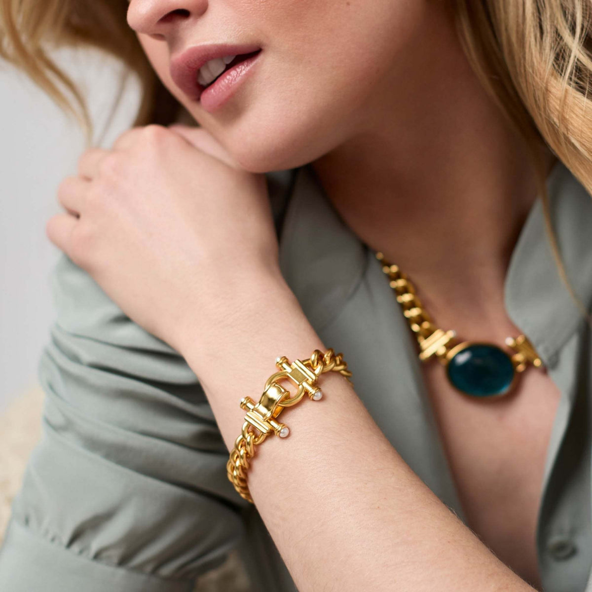 Dolce Demi Link Bracelet with glass pearls on a gold plate chain featuring a fold-over clasp