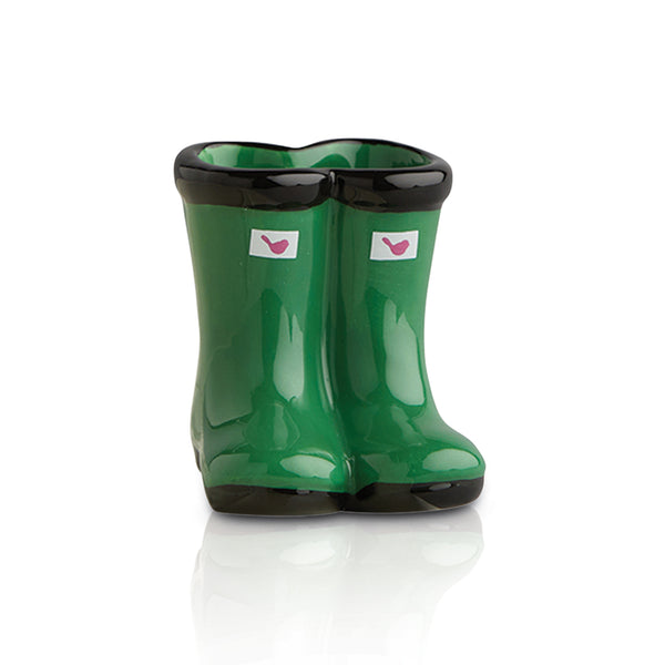 Green ceramic rain boot salt and pepper shaker set with pink bird logo and black trim.