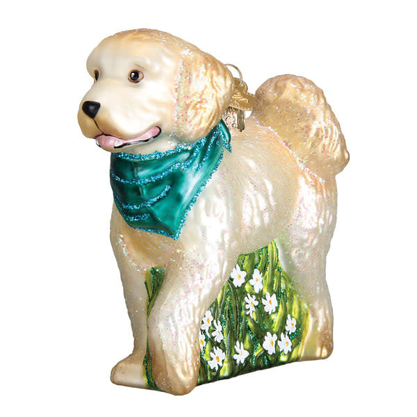 Red ceramic dog ornament shaped like a Doodle with curly fur texture.