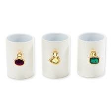 White porcelain mug with gem embellishments featuring three printed sayings.
