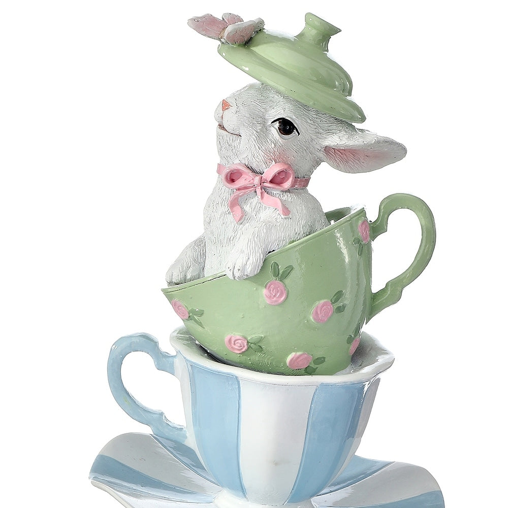 Eleven-inch resin stack of whimsical tea cups topped with an adorable bunny silhouette.