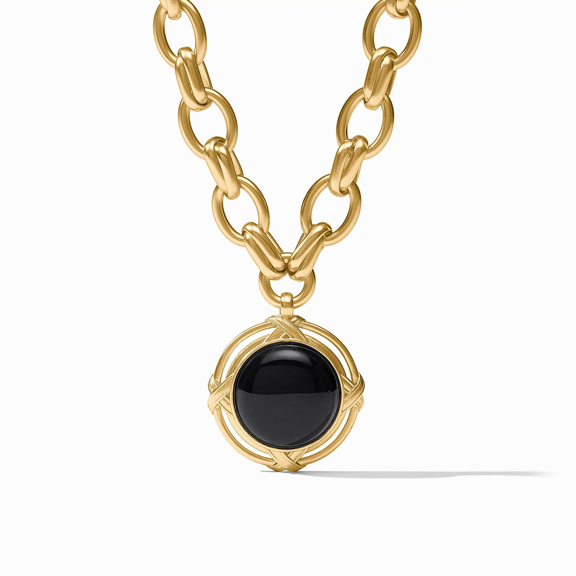 Essex Statement Necklace featuring a gold link chain and a round black onyx pendant.