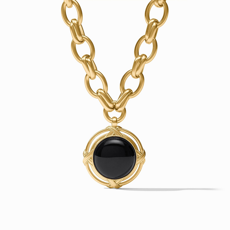 Essex Statement Necklace featuring a gold link chain and a round black onyx pendant.