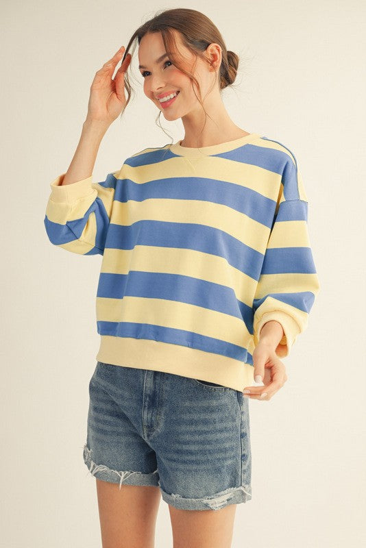 Roxanne V-neck casual top in bold stripe print with a relaxed silhouette.