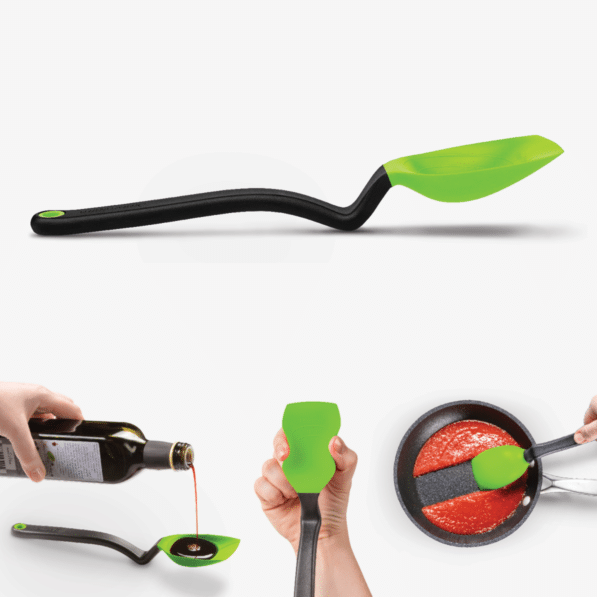 Green silicone Supoon spoon with weighted handle designed to stand upright on counters.