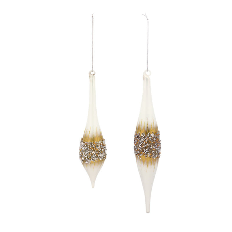White glass drop ornament with gold tones and beaded accents hanging from a string.