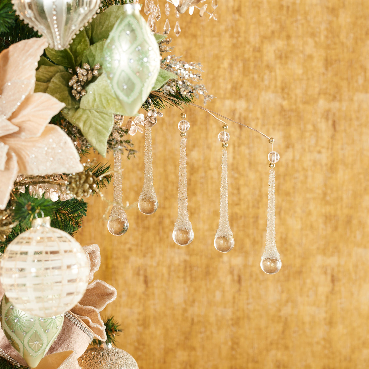Plastic drop spray with clear and frosted teardrop ornaments on delicate stems.