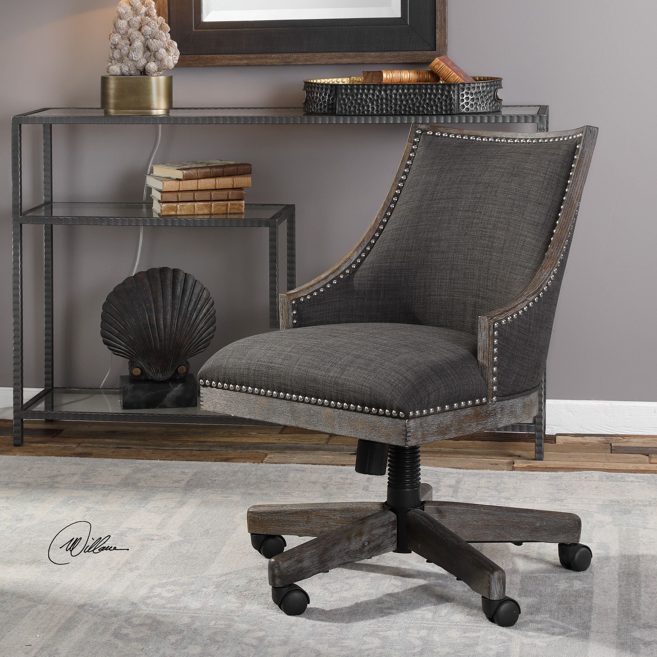 Aidrian charcoal desk chair with a modern curved backrest.