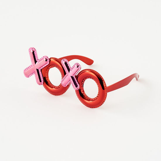XOXO PVC sunglasses with a black frame featuring an X-shaped bridge detail.