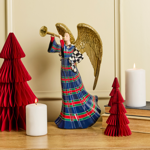 Timeless Tartan Angel Figurine with gold wings and trumpet, standing between red paper trees.