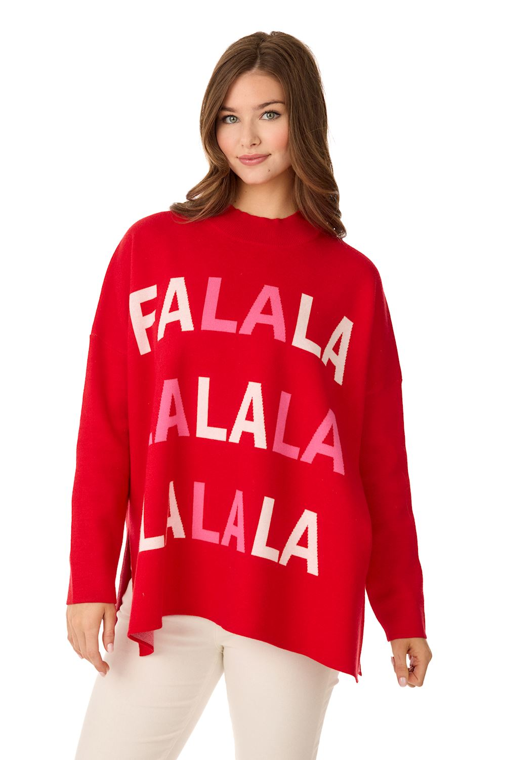 Woman wearing a red Holiday Jacquard Sweater with pink and white 'FALALA' text and side slit hem.