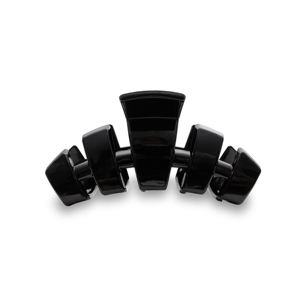 Medium-sized classic hair clip in a neutral tone with a rectangular shape.