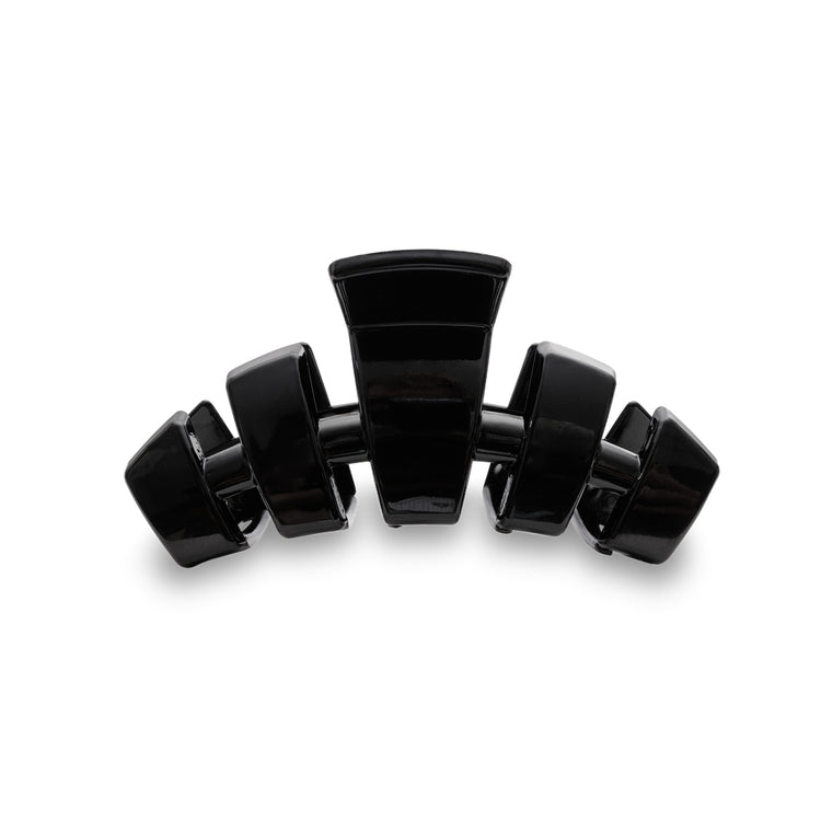 Medium-sized classic hair clip in a neutral tone with a rectangular shape.