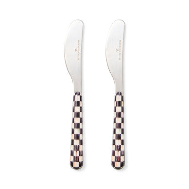 Two stainless steel bistro spreaders with a sleek handle design.