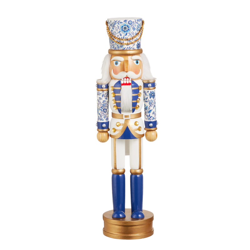 14.75-inch wooden nutcracker with blue and white chinoiserie floral patterns and gold accents.