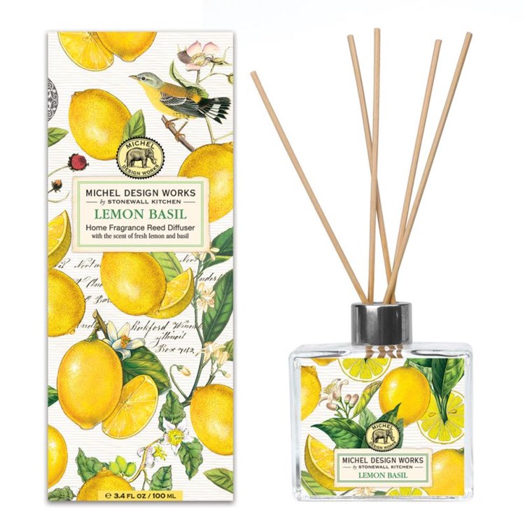Glass reed diffuser bottle with clear liquid and wooden sticks inside