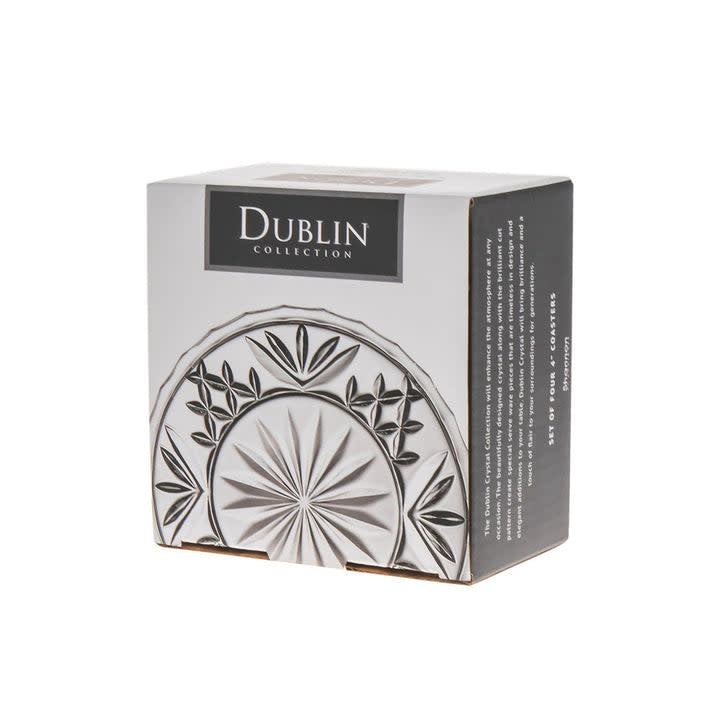 Set of four Dublin crystal coasters with brilliant-cut patterns in clear glass.