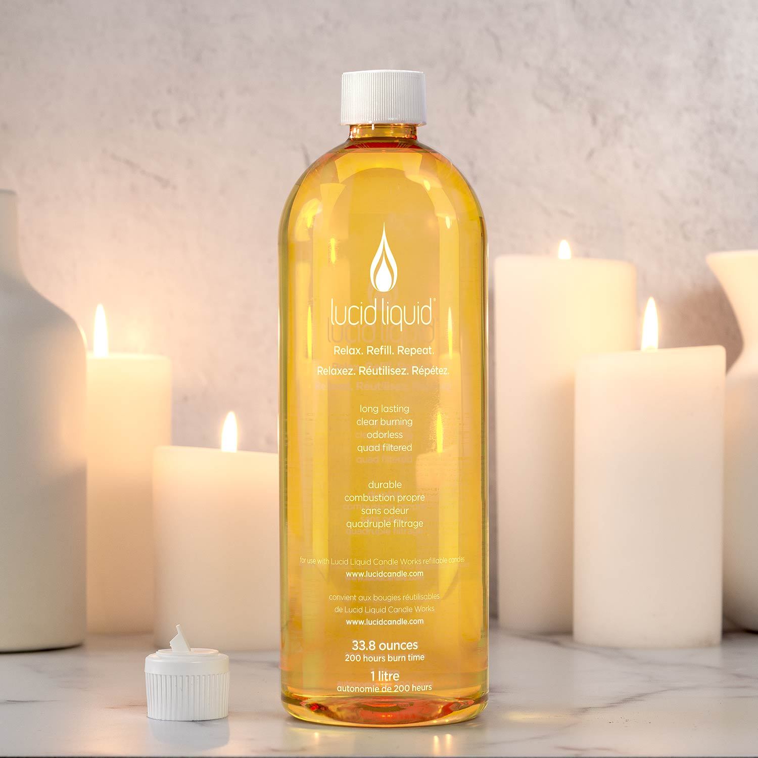 One Liter Bottle Lucid Liquid wax in a clear container.