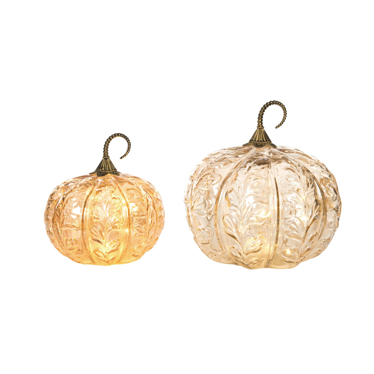 Two amber glass light-up pumpkins with petal patterns and bronze-colored curly stems.