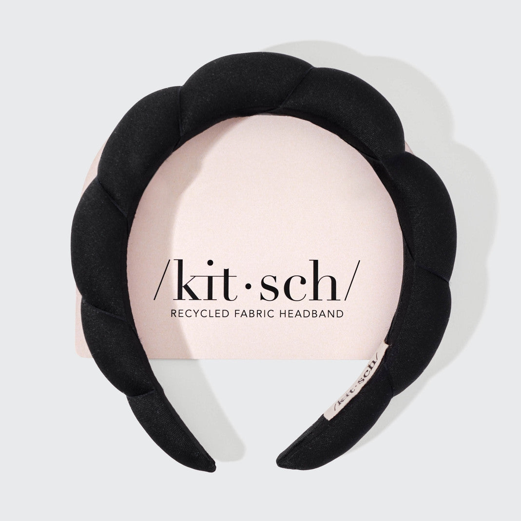 Black recycled fabric puffy headband with a soft, rounded silhouette.