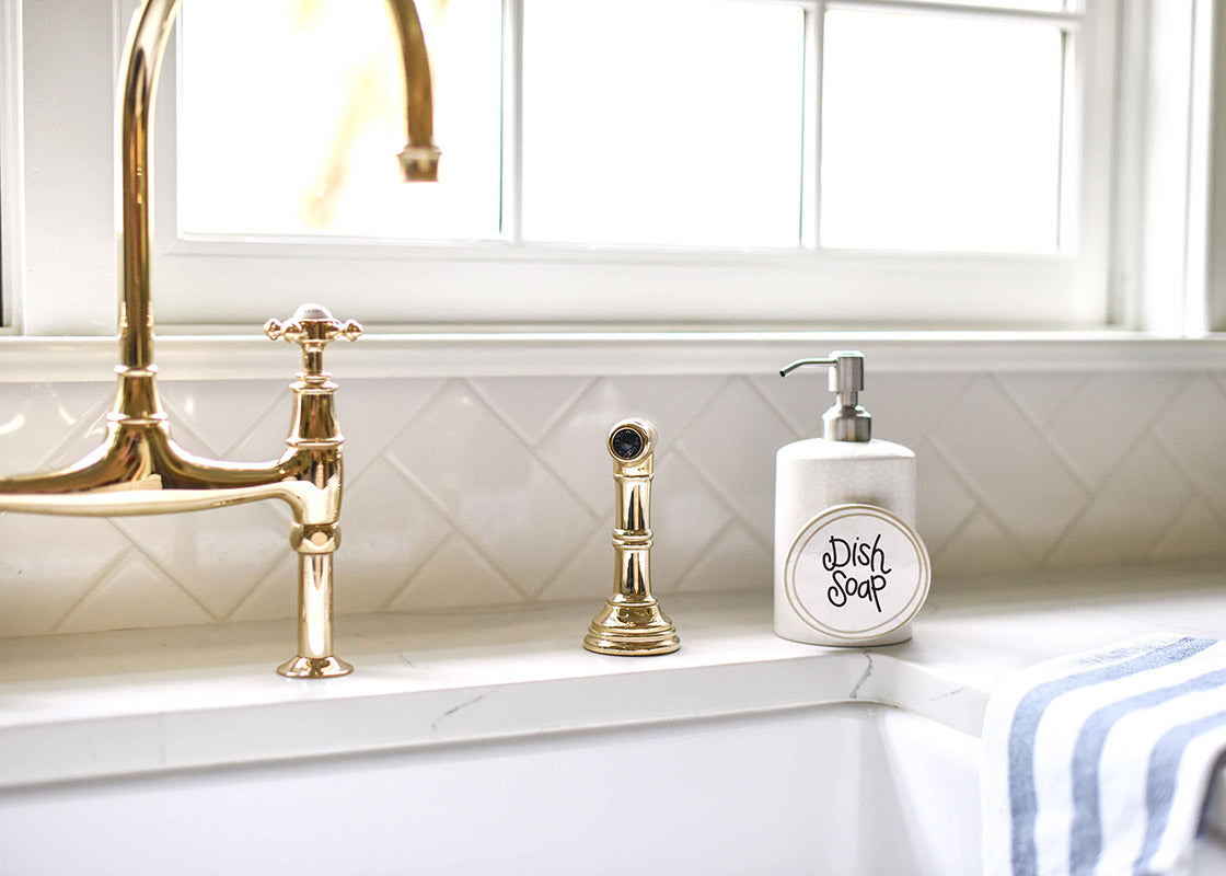 White ceramic mini cylinder soap pump with small dot pattern on lid