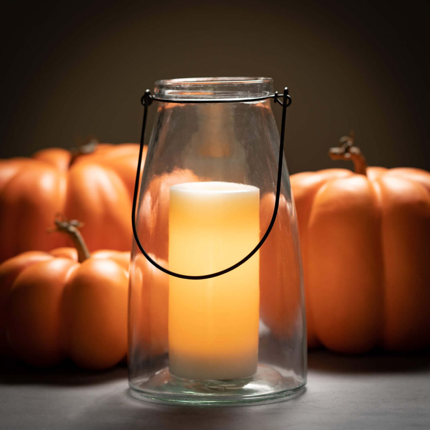 Bright orange faux pumpkin made from lightweight styrofoam with a natural realistic silhouette.
