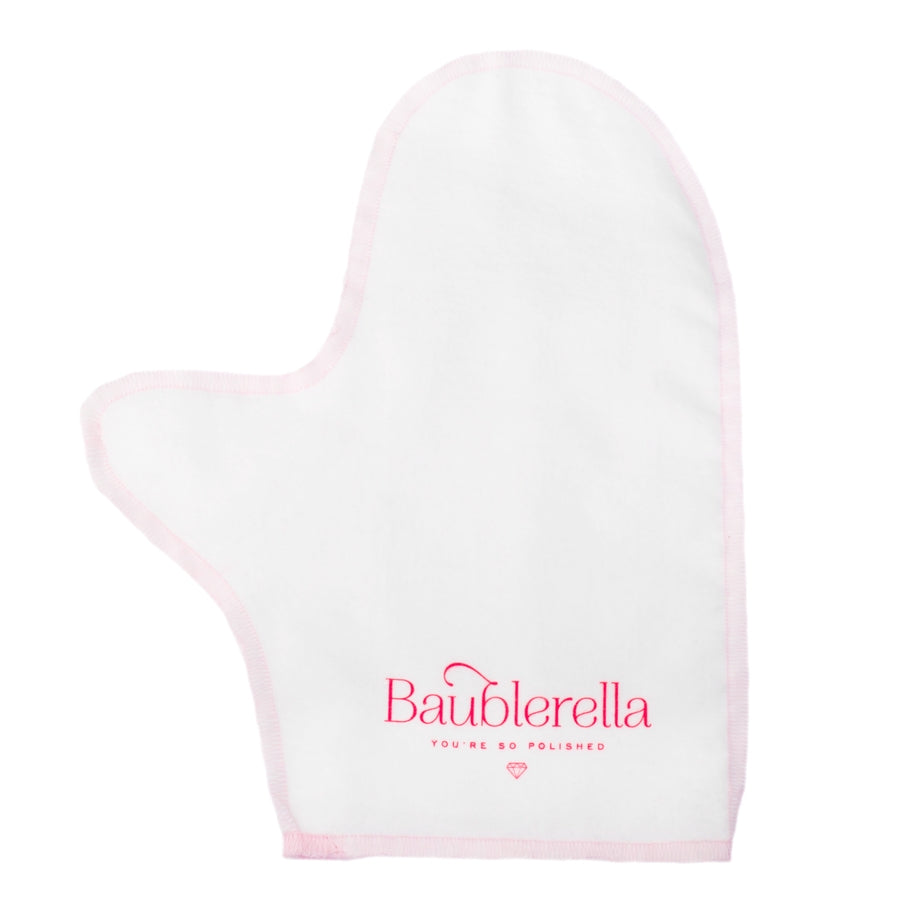White Baublerella Glitzy Glove anti-tarnish jewelry polishing mitt with pink trim and logo.