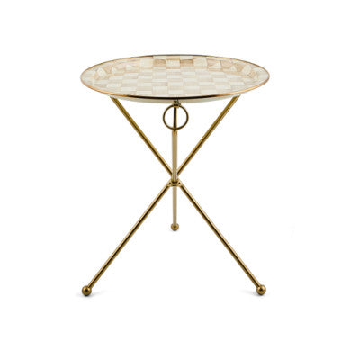Round mocha check enamel accent table with bronzed stainless steel rim