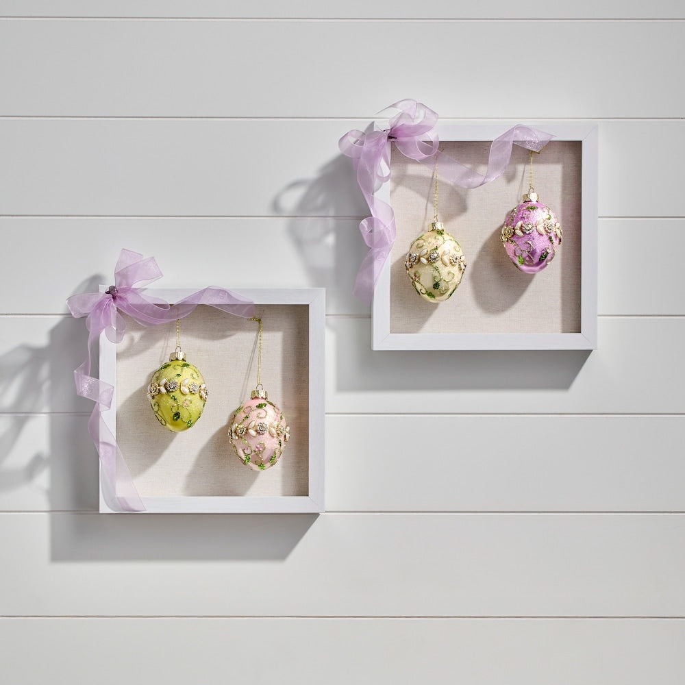 Glass jewel fleurette egg ornament with a floral petal shape in clear glass.