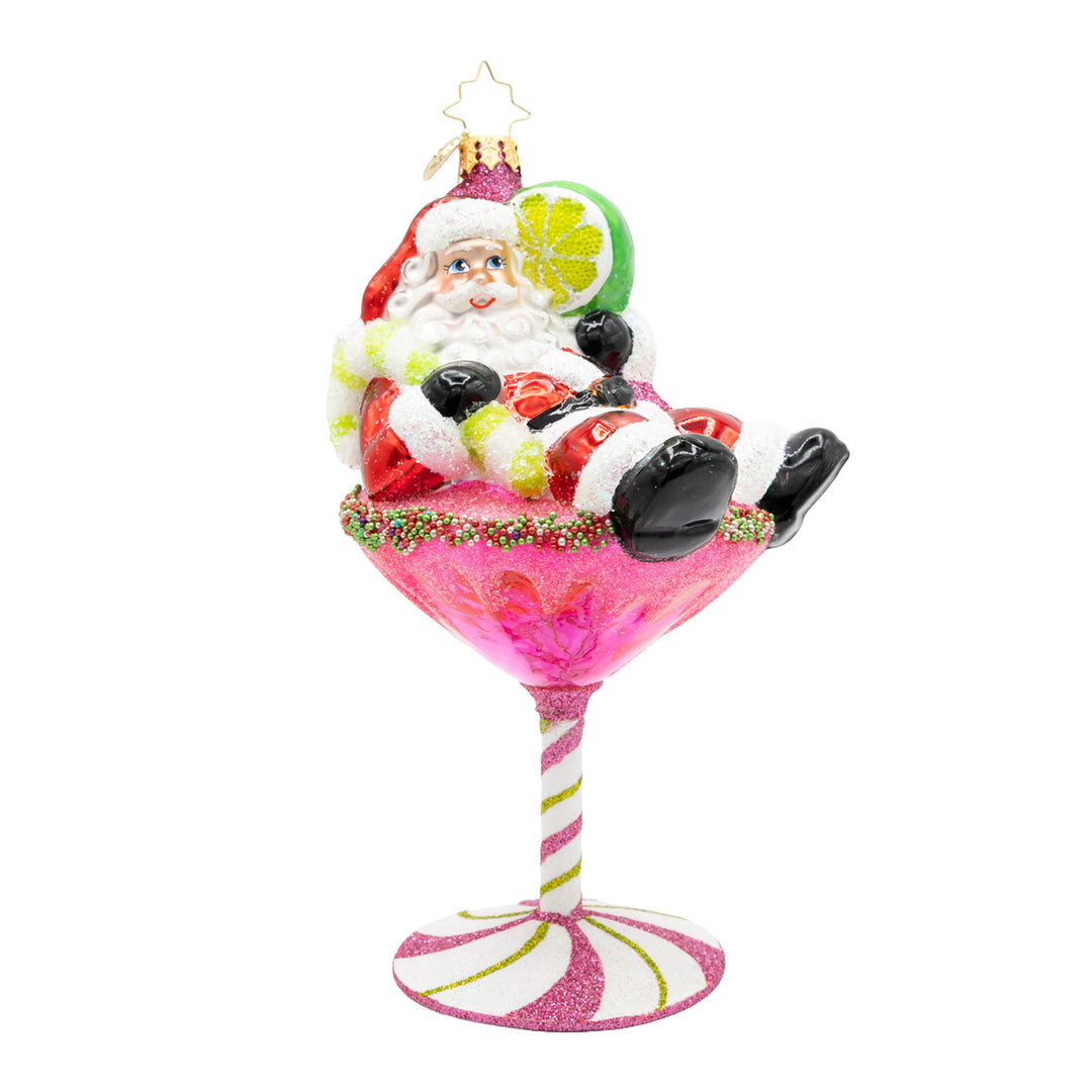 Santa Claus relaxing in a pink glittery cosmopolitan martini glass Christmas ornament.