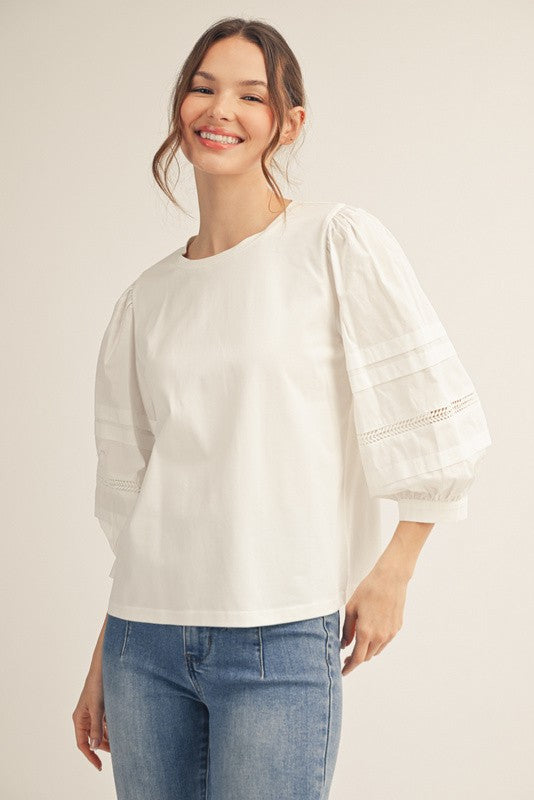 Alice solid top with ladder lace trim at neckline and cuffs