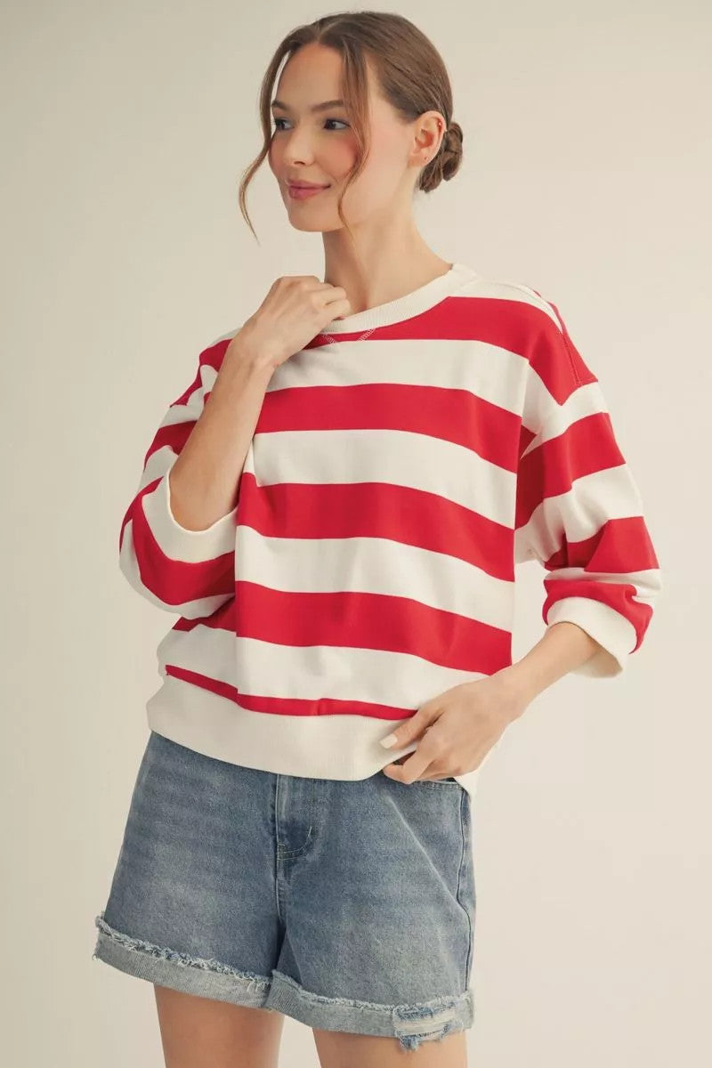 Roxanne V-neck casual top in bold stripe print with a relaxed silhouette.