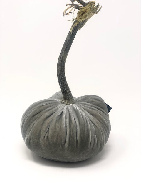 Handmade orange velvet pumpkin with a natural stem.