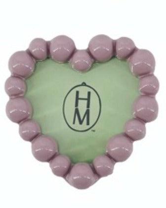Heart-shaped resin photo frame magnet with a purple beaded border and green center.