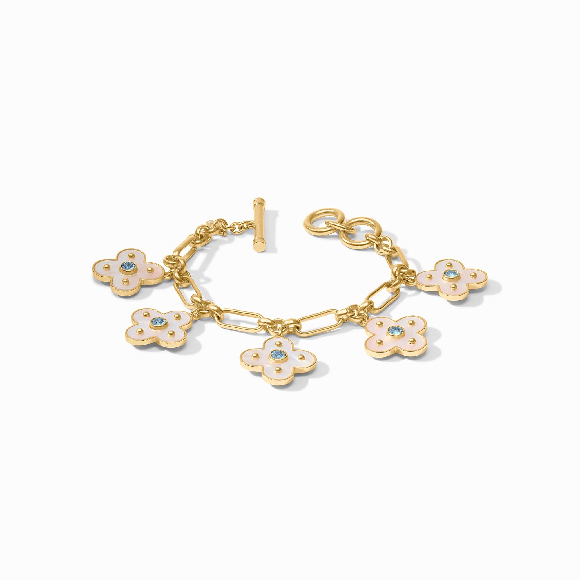 Colette charm bracelet featuring a toggle clasp with mother-of-pearl accents and cubic zirconia stones on gold-plated links.