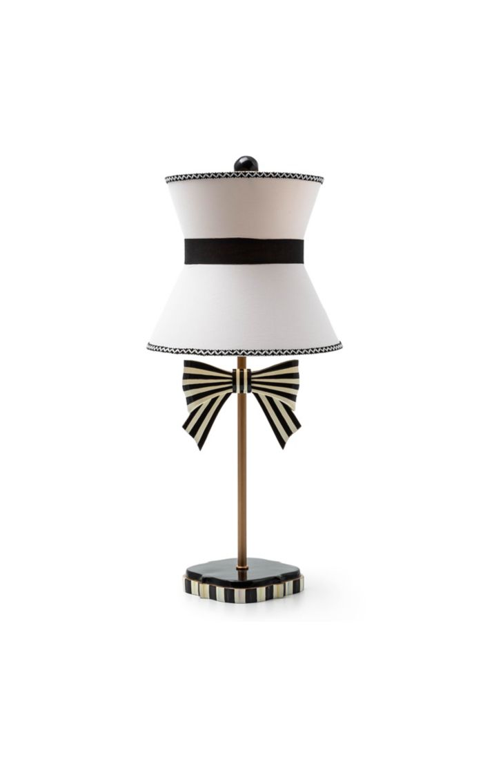 Pretty As A Bow Table Lamp with a white shade, black ribbon, and a striped bow on a brass stem.