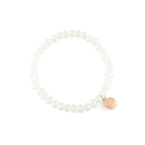 Stretchy beaded bracelet with faceted glass beads in a colorful pattern.